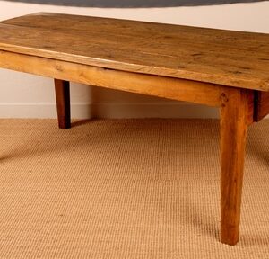 An early 19th Century French elm farmhouse table