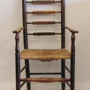 An unusual 19th Century English ash and elm ladder back chair