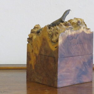 A recent Australian eucalyptus root hinged box having a bronze Iguana to the top