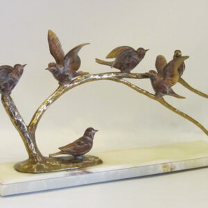 A decorative 20th Century French gilt and bronzed grouping of birds