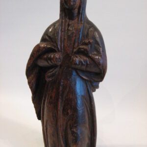 A decorative 17th-18th European walnut carved Madonna