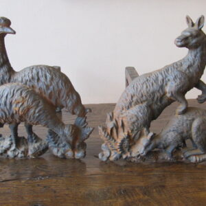 A pair of Australian fauna andirons of emus & kangaroos