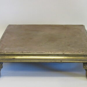 19th Century brass tailor's stand supported by lion paw feet