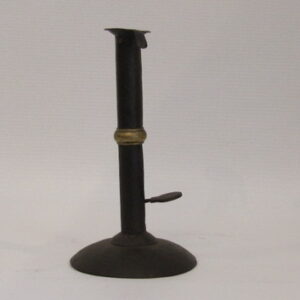 A replica of a late 18th Century English sheet, iron & brass wedding band candle stick holder