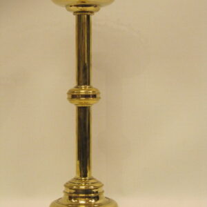 A pair of 19th Century English Gothic Revival brass candlesticks