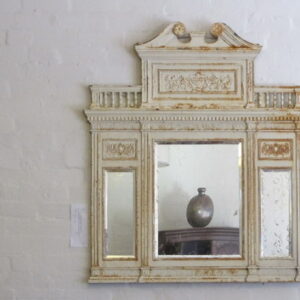 An unusual late 19th Century, early 20th Century English cast iron mantle/wall mirror