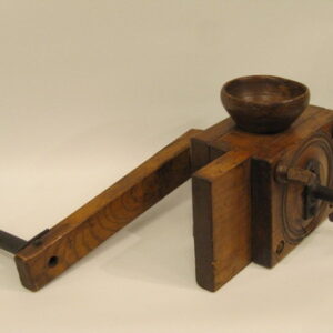 An early 19th Century French elm bench pepper mill