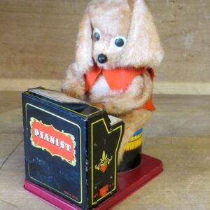 Rare collector's vintage musical battery operated dog called 'Beethoven' playing the piano - AA1971
