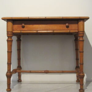 An unusual 19th Century English poplar and pine faux bamboo side table