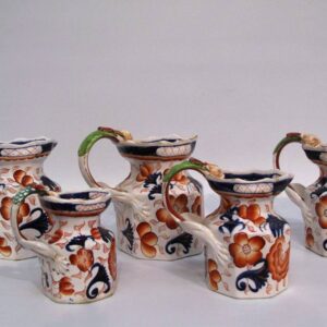 Harlequin set of five 19th Century Ironstone lion handle jugs - CBES58