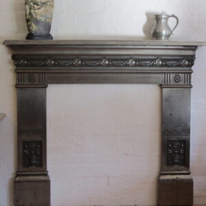 A 19th Century English cast iron fire place in Adam style