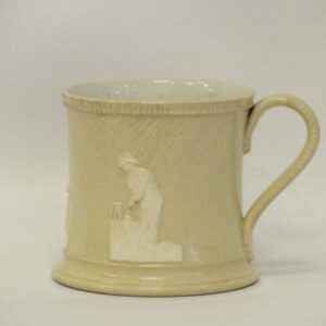A first half 19th Century English ceramic cricketer's mug