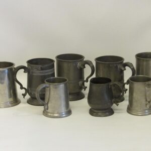 A collection of eight 18th - 20th Century English pewter tankets - CJL500