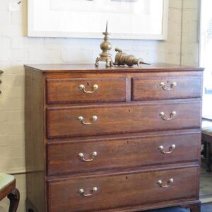 An unusually large late Georgian country Oak chest of drawers.