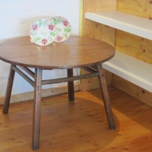 A very well patinated second half 19th Century Chinese pine circular occasional/breakfast table