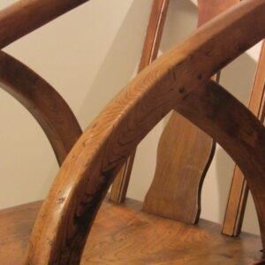 An unusual late 19th Century Northern European elm well shaped armchair - CGS909