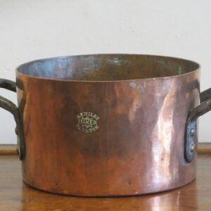 Round copper and iron handled lidless pot