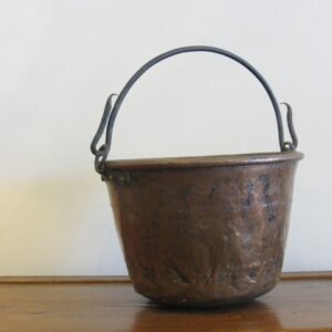 Tall copper and iron handled cooking container