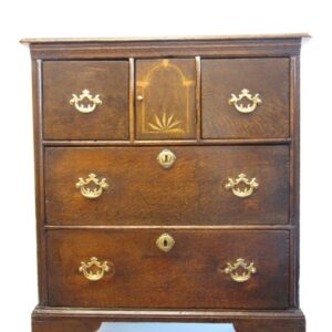 A decorative 18th Century English oak chest of drawers