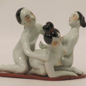 A provocative 20th Century Japanese ceramic of a group of adults (some images may offend)
