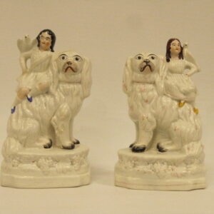 A pair of rare mid 19th Century Staffordshire dogs with figures and birds