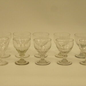 A harlequin set of ten late Georgian English glass rummers