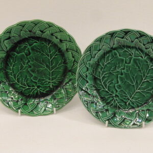 A pair of decorative green Majolica plates