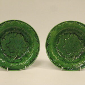 A pair of 19th Century green majolica soup bowls