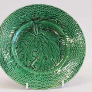 A 19th Century French green majolica plate
