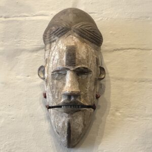 Mid 20th Century Ivory Coast, Carved Hanging Face