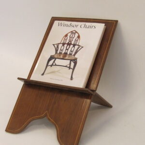 An unusual 19th Century French mahogany bookstand with satinwood stringings