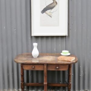 An unusual French Walnut side/bedside Table