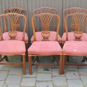 An attractive set of six late 19th Century English mahogany Hepplewhite style dining chairs