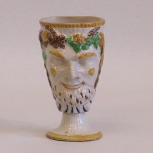 A 19th Centuiry French Ceramic face mug having a frog inside