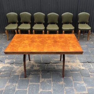 A Rare 20th Century French Retro Dissembling Figured Birdseye Maple & Wanut Dining Table with six matching upholstered dining chairs