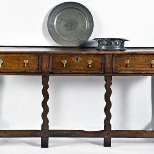 A Decorative 18th Century English Oak and Elm Dresser Base