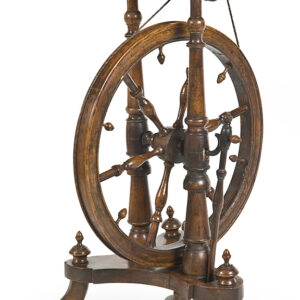 An exceptional 19th Century French walnut and mixed timber spinning wheel