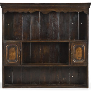 An 18th Century hanging English oak dresser rack of small proportions