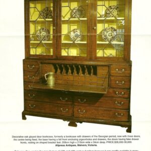 A decorative 18th Century English oak glazed door bookcase