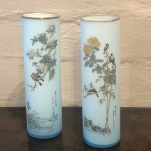 An Attractive Pair of 20th Century Floral and Bird Decorated Powder Blue Tubular Glass Vases.