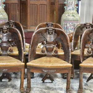 An unusual set of Six 19th Century French, Egyptian Sphinx style chairs