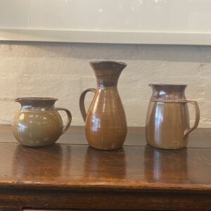 Three attractive Australian pottery jugs.