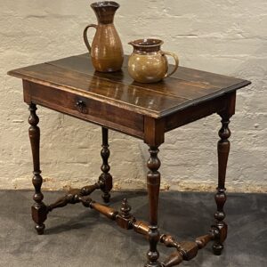 A pleasant mid 19th century French fruitwood and oak side table.