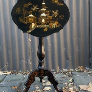 A delightful last quarter 19th century French chinoiserie design gilt and mother of pearl inlaid table