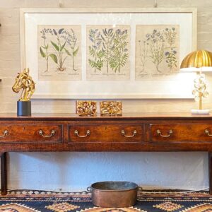 An outstanding 18th Century English oak dresser base of unusually long proportions