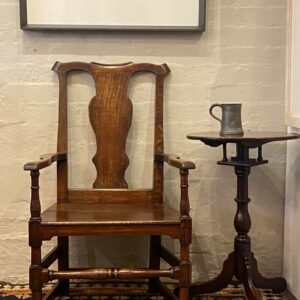 A striking 18th century French oak, country chippendale style armchair