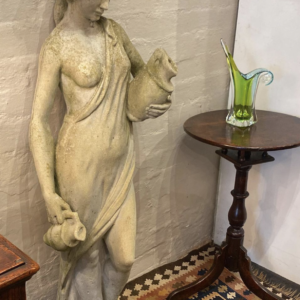A Decorative Tall Vintage Concrete Garden Statue