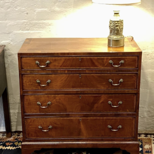 An unusual 19th century English Recency/Georgian revival figured mahogany chest of drawers