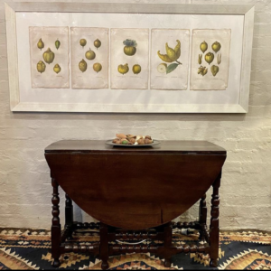 First quarter 18th century English oak gate-leg table.