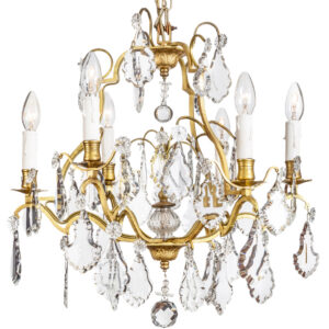 A striking 19th century six branch  French brass and crystal chandelier.